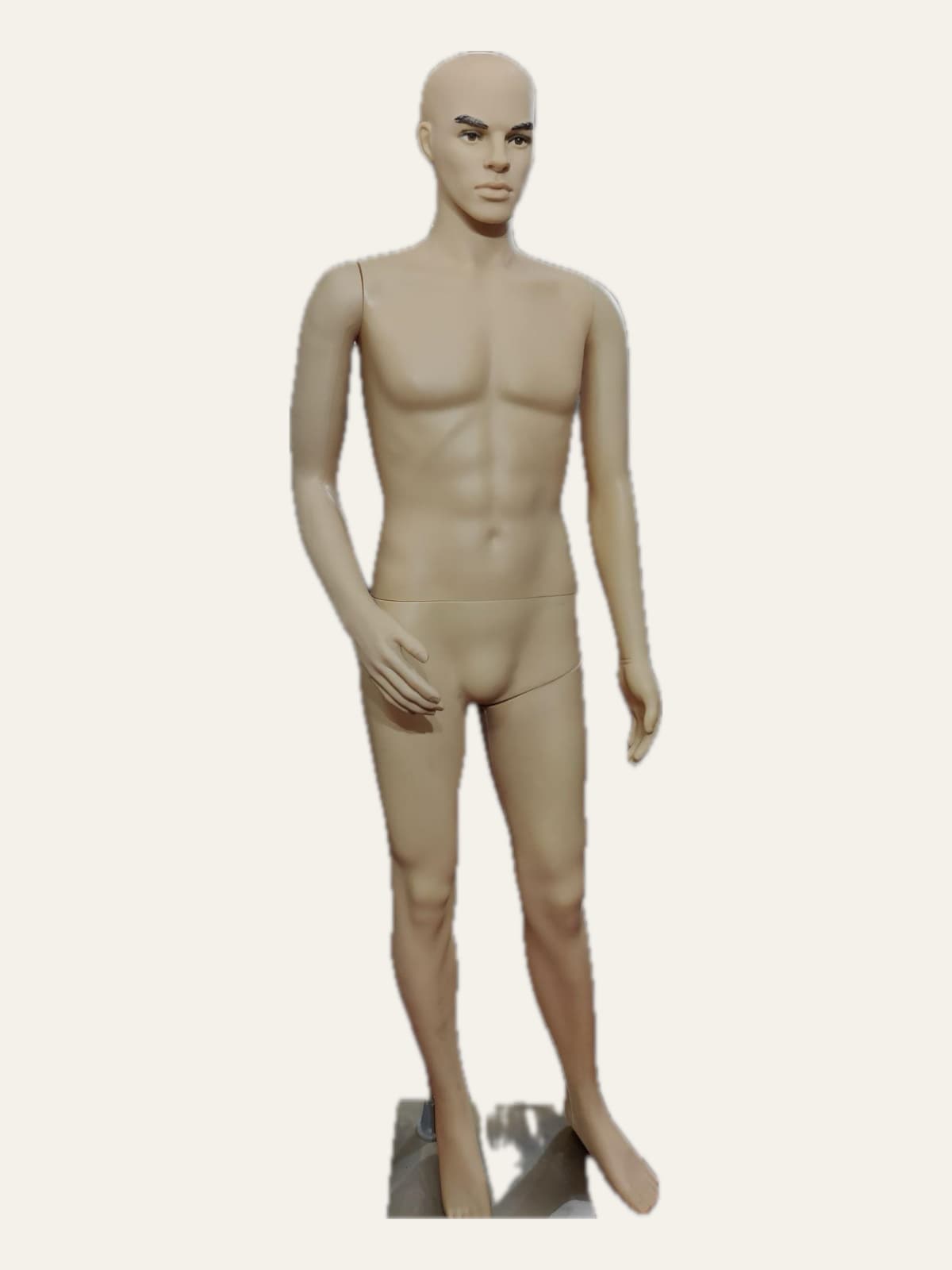 Male full-body mannequin in a natural skin finish, standing