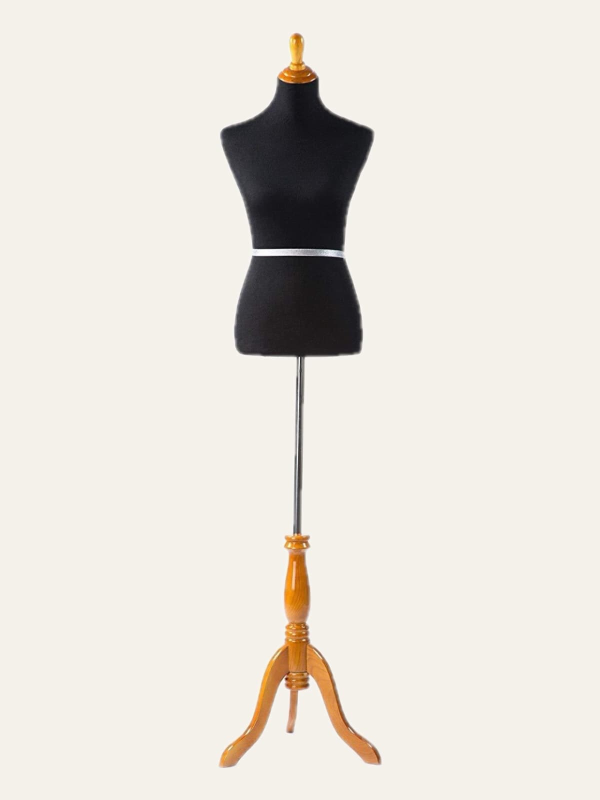 Black female dress form on a three-legged wooden tripod stand